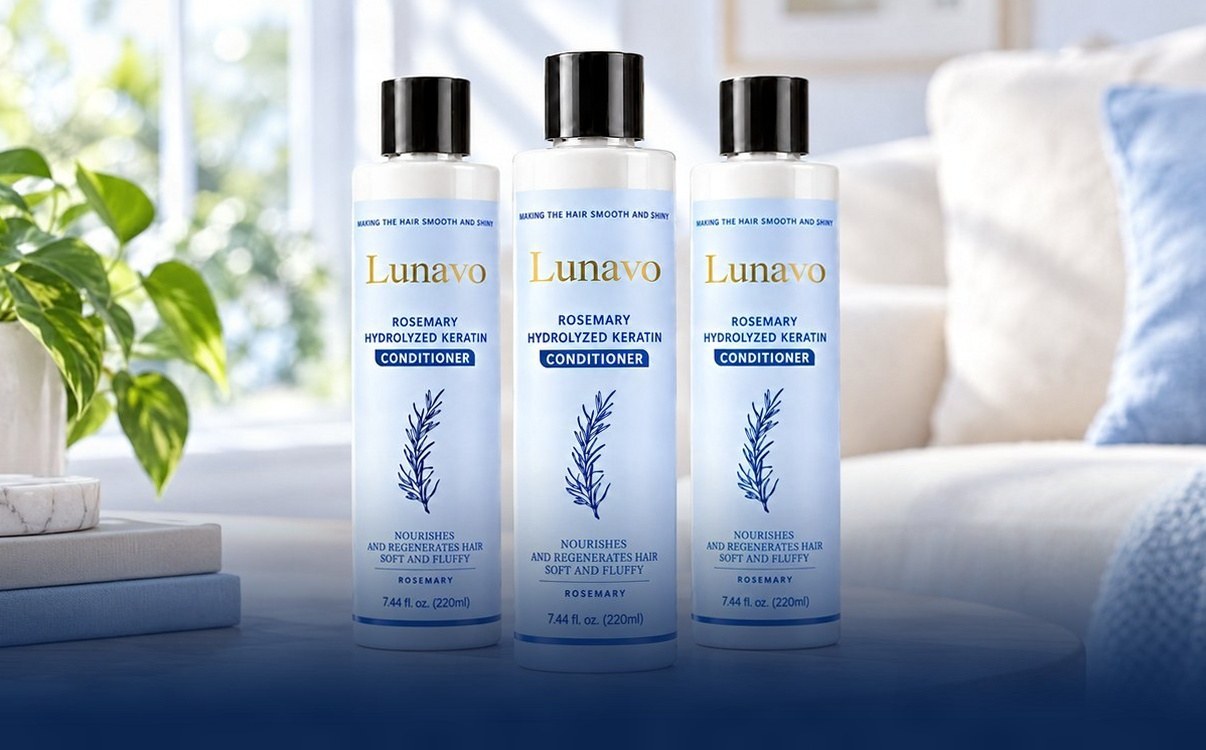 Three bottles of Lunavo Rosemary + Keratin Conditioner on a table